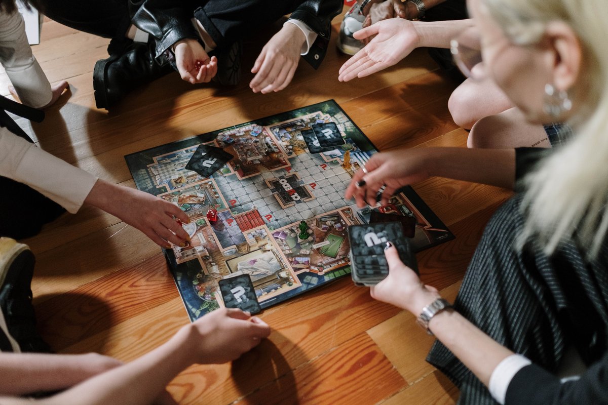 People playing a board game.